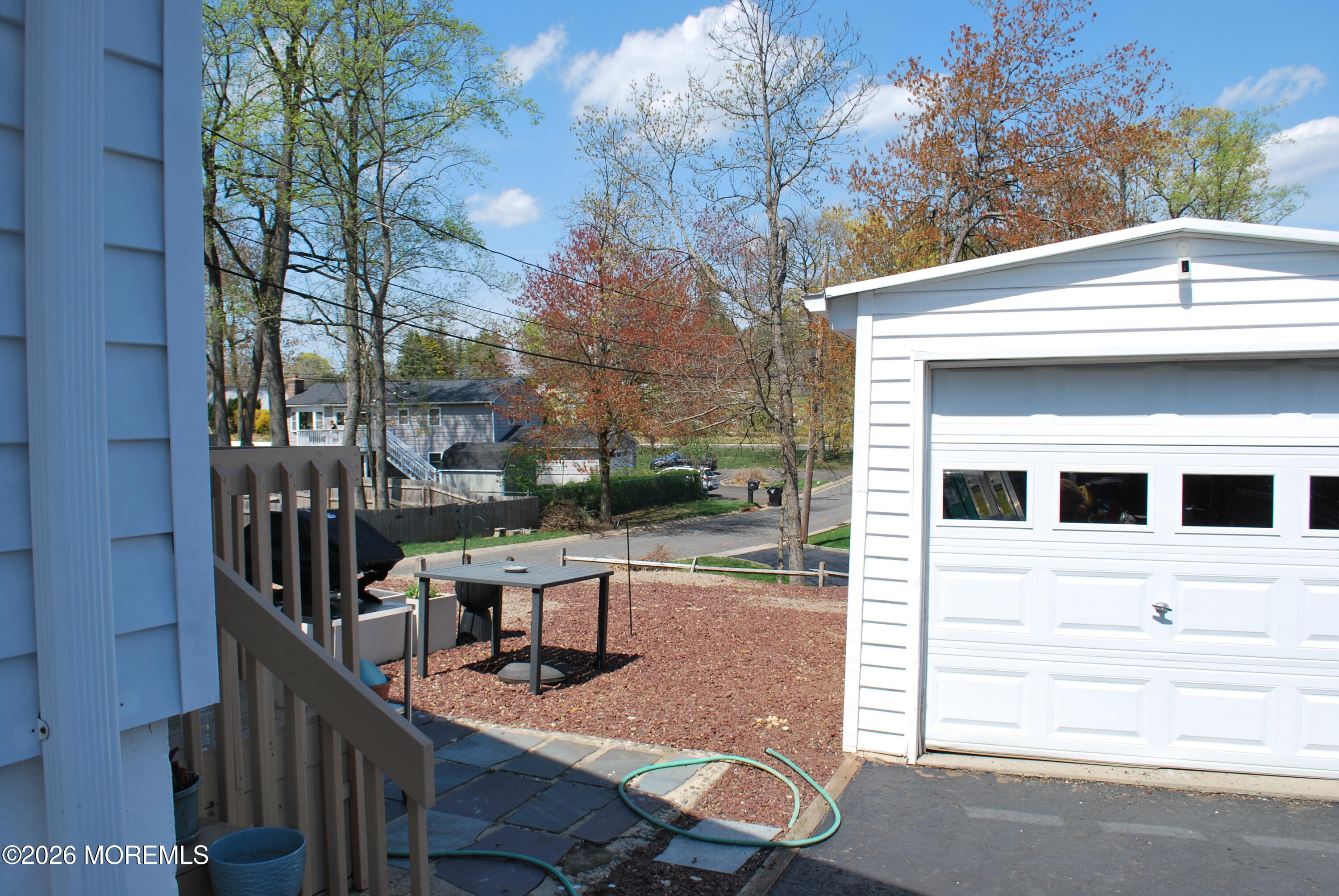 7 Houston Street Red Bank, NJ 07701 - Photo 10 of 38 a view of house with backyard and seating area