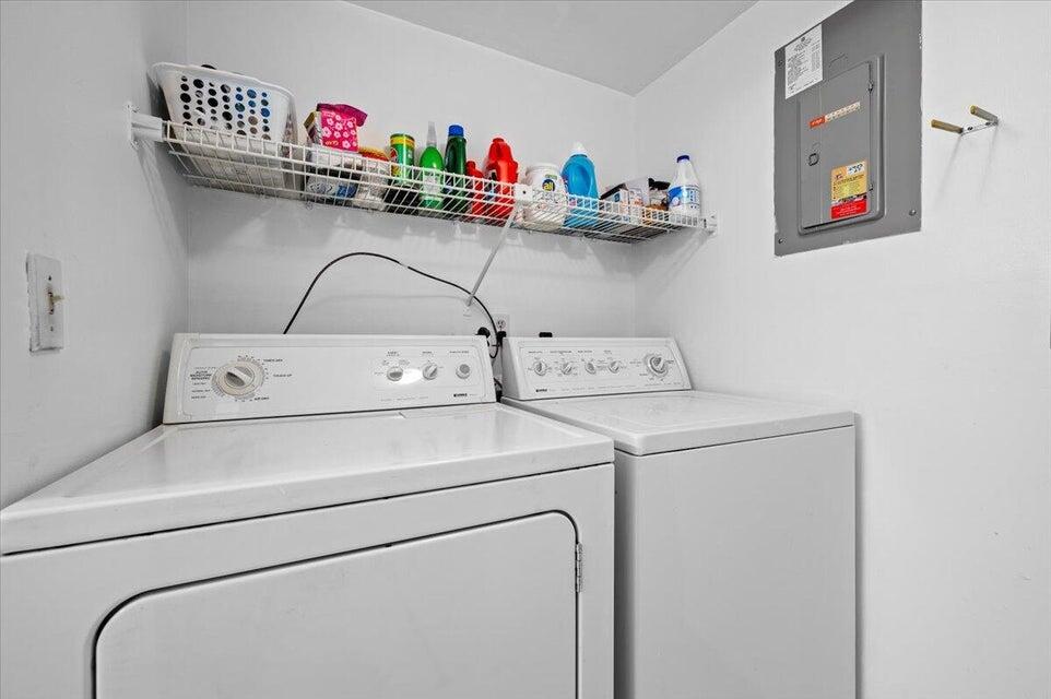 436 Pine Glen Lane, Unit B2 Greenacres, FL 33463 - Photo 13 of 19 a utility room with dryer and washer