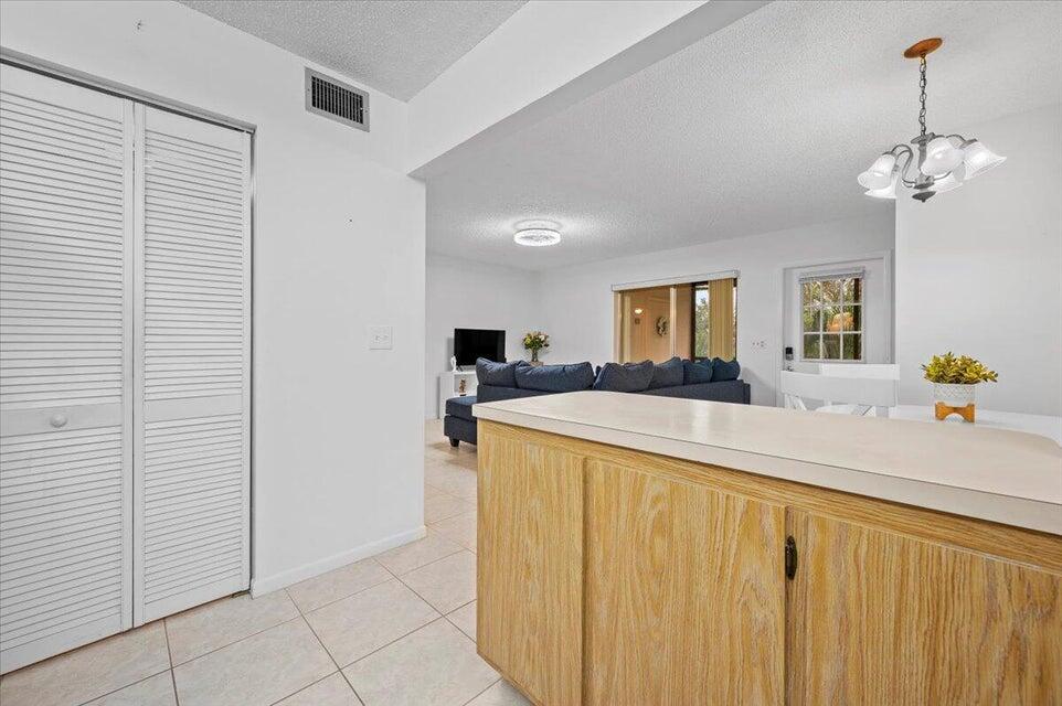 436 Pine Glen Lane, Unit B2 Greenacres, FL 33463 - Photo 7 of 19 a view of a kitchen from the kitchen