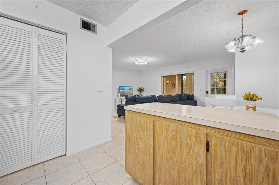 436 Pine Glen Lane, Unit B2 Greenacres, FL 33463 - Photo 8 of 19 a view of a kitchen from the kitchen