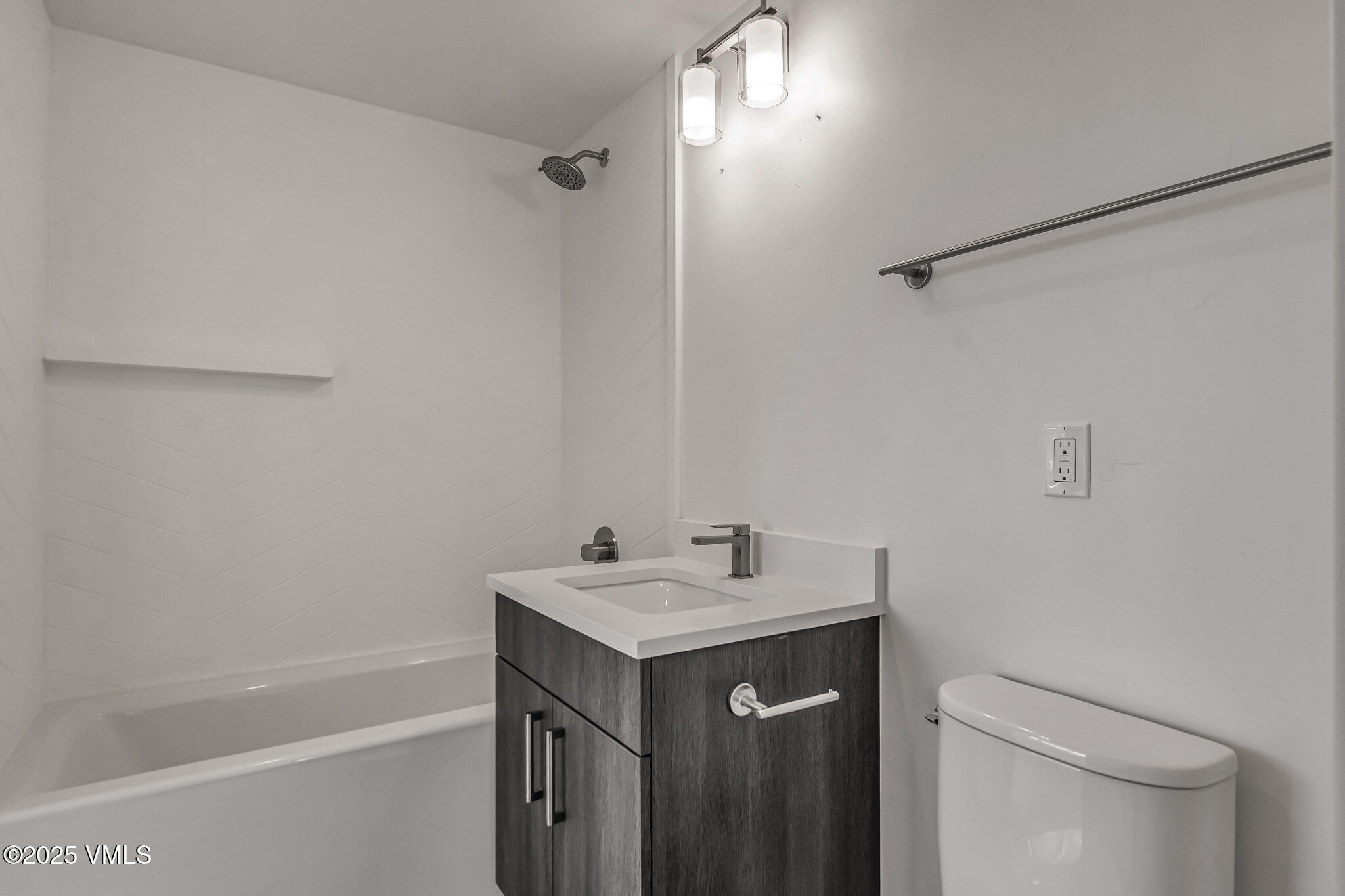 91 Mount Hope Circle, Unit C101 Eagle, CO 81631 - Photo 13 of 14 a bathroom with a sink a toilet and shower