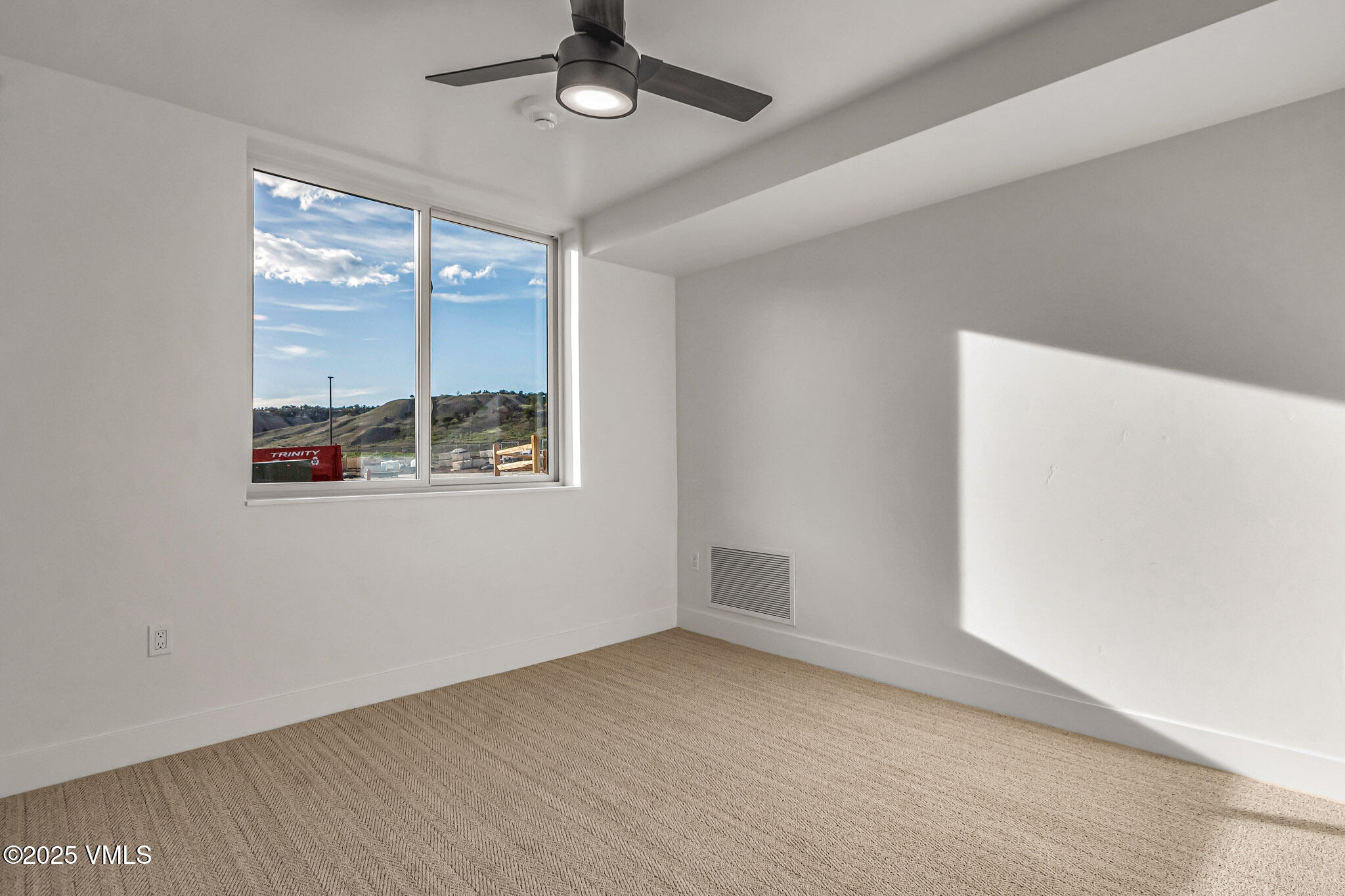 91 Mount Hope Circle, Unit C101 Eagle, CO 81631 - Photo 6 of 14 an empty room with a window
