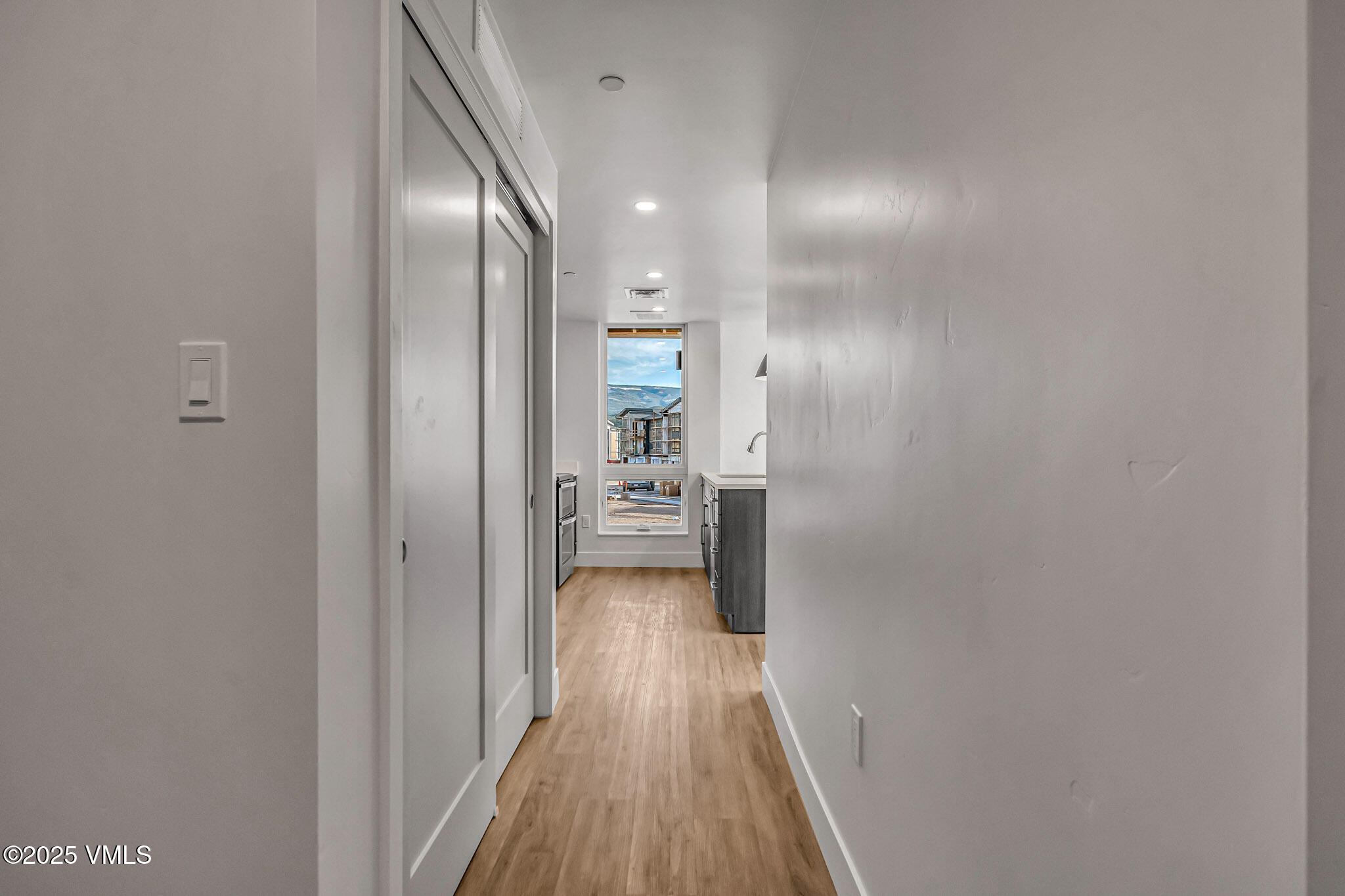 91 Mount Hope Circle, Unit C101 Eagle, CO 81631 - Photo 10 of 14 a view of a hallway with wooden floor