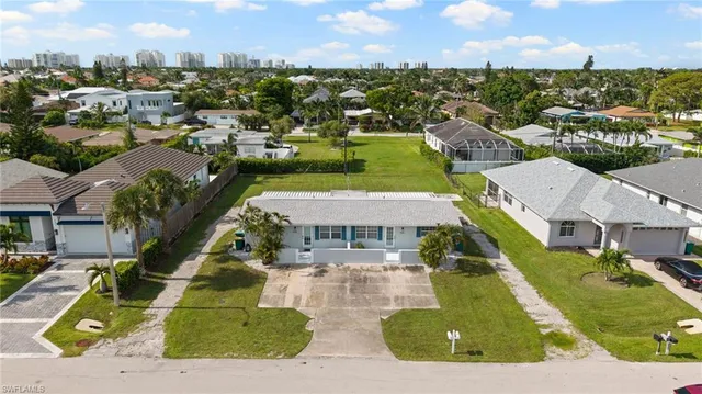 a view of a city with lawn chairs