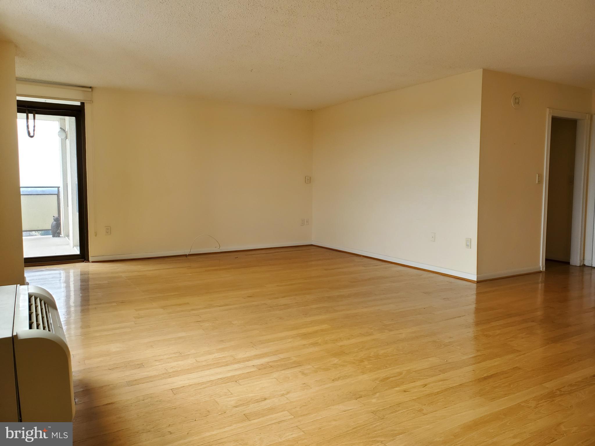 205 East Joppa Road, Unit 2105 Towson, MD 21286 - Photo 19 of 46 Dining area with access to balcony