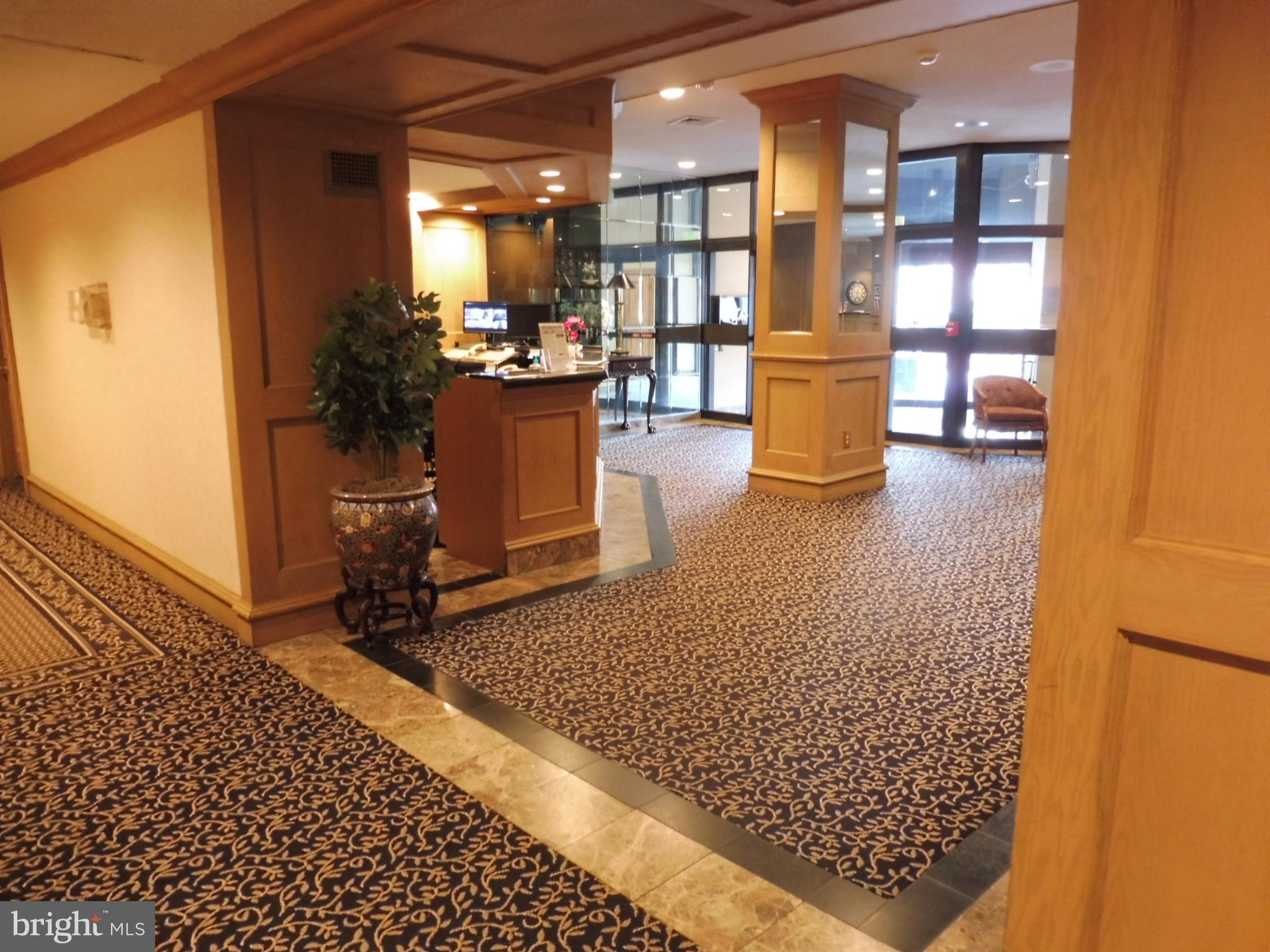 205 East Joppa Road, Unit 2105 Towson, MD 21286 - Photo 4 of 46 24/7 Lobby Reception Desk