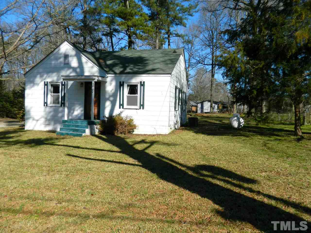 500 Grovemont Road Raleigh, NC 27603 - Photo 2 of 18 a front view of a house with a yard