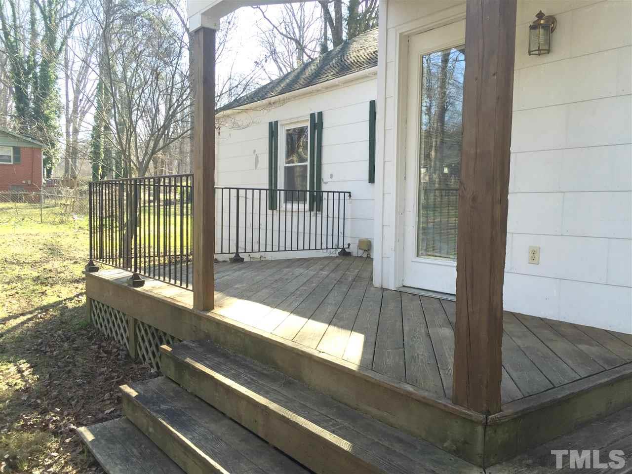 500 Grovemont Road Raleigh, NC 27603 - Photo 13 of 18 a view of a room with wooden floor and fence