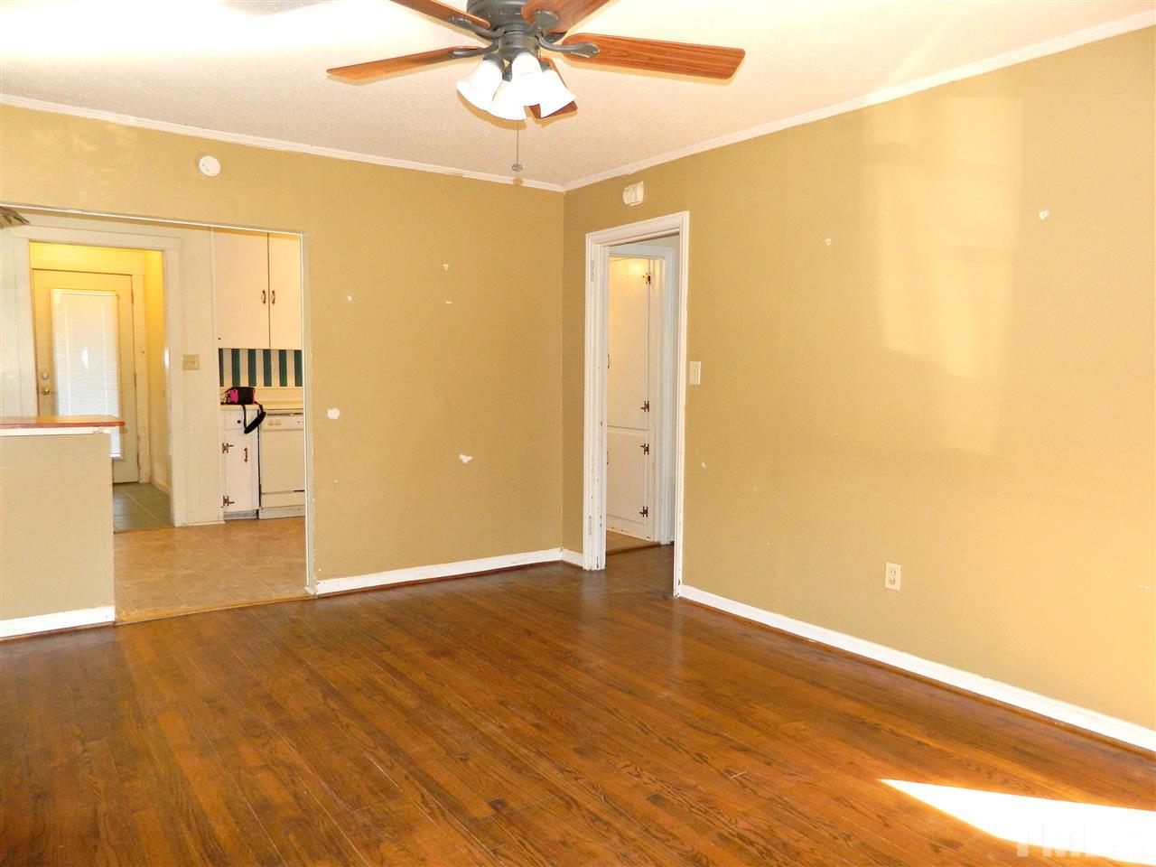 500 Grovemont Road Raleigh, NC 27603 - Photo 4 of 18 a view of an empty room with wooden floor