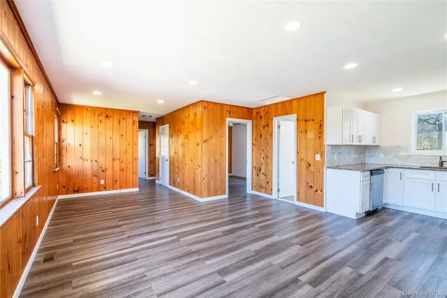 a view of a beach with a city