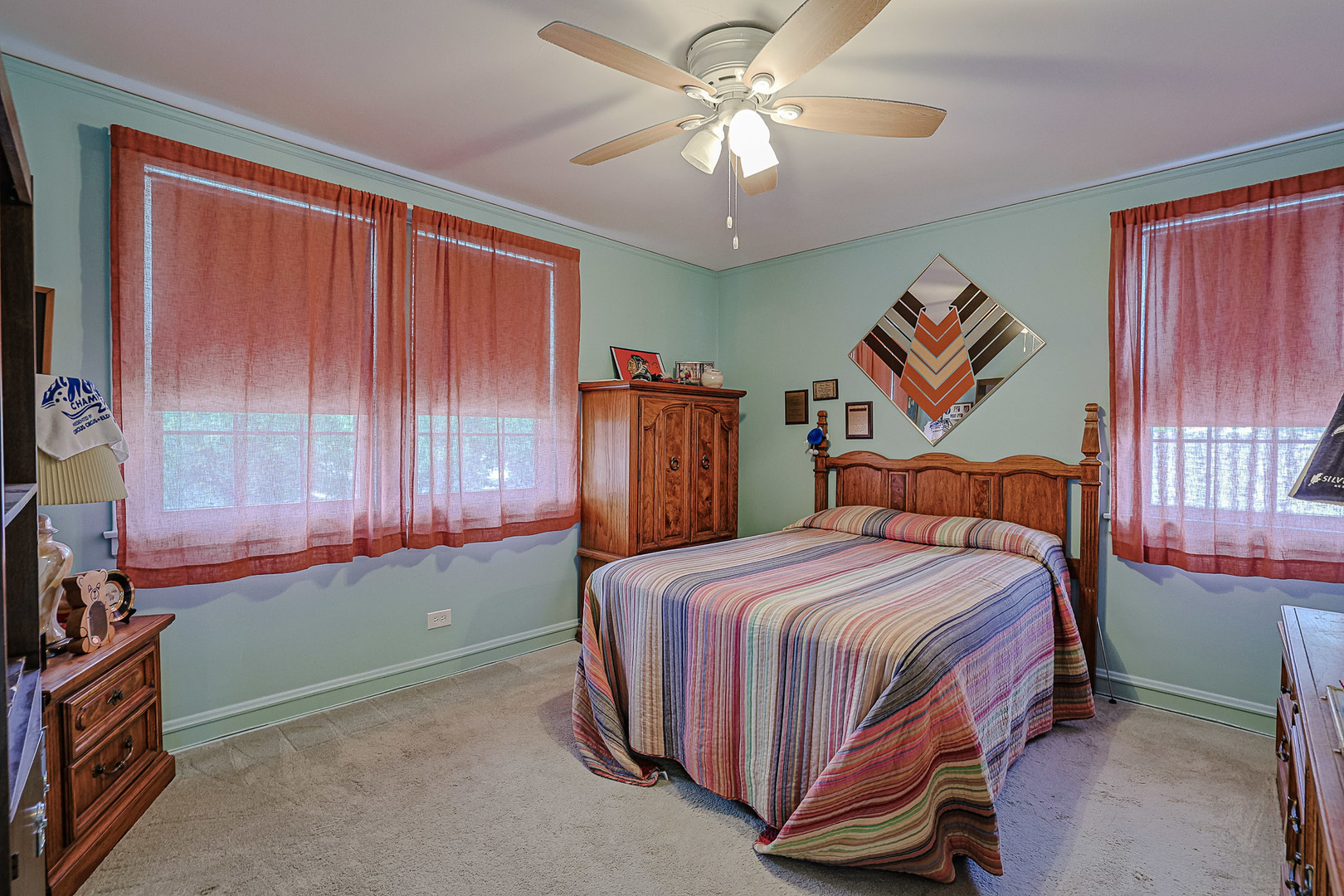 5245 North Rutherford Avenue Chicago, IL 60656 - Photo 11 of 21 a bedroom with a bed and a chandelier