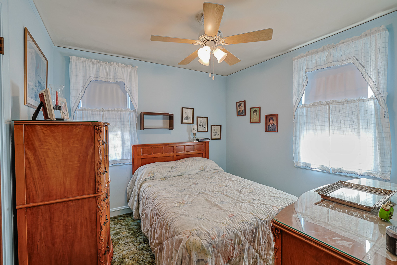 5245 North Rutherford Avenue Chicago, IL 60656 - Photo 13 of 21 a bedroom with a bed and a refrigerator