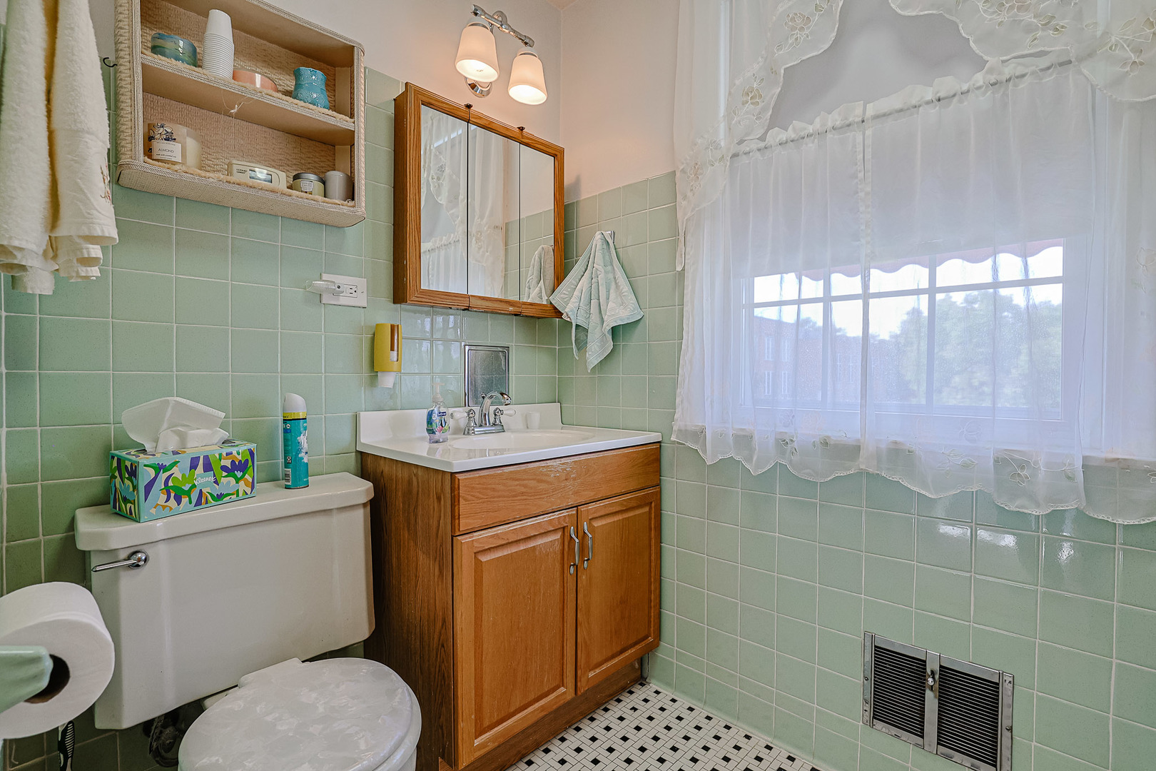 5245 North Rutherford Avenue Chicago, IL 60656 - Photo 14 of 21 a bathroom with a sink toilet vanity and shower