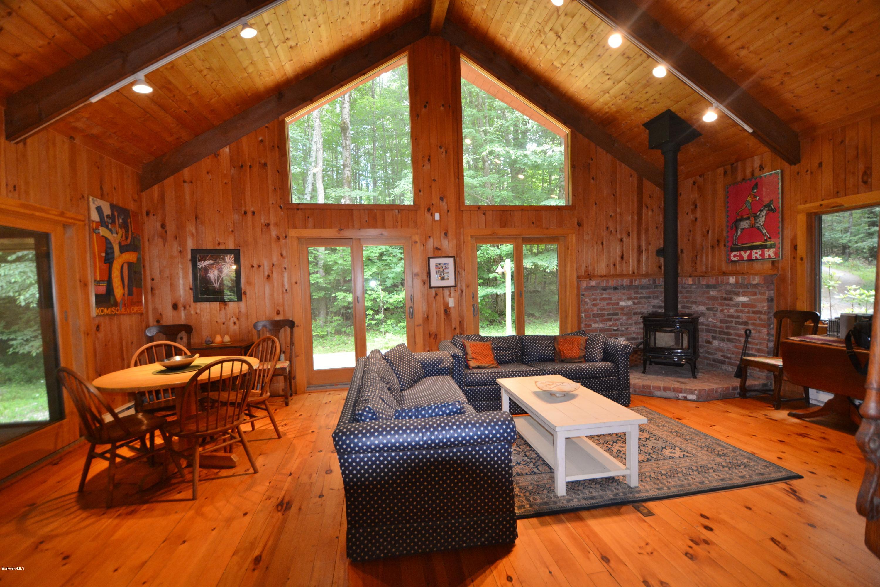 395 Bonny Rigg Hill Road Becket, MA 01223 - Photo 2 of 26 a living room with furniture and a large window