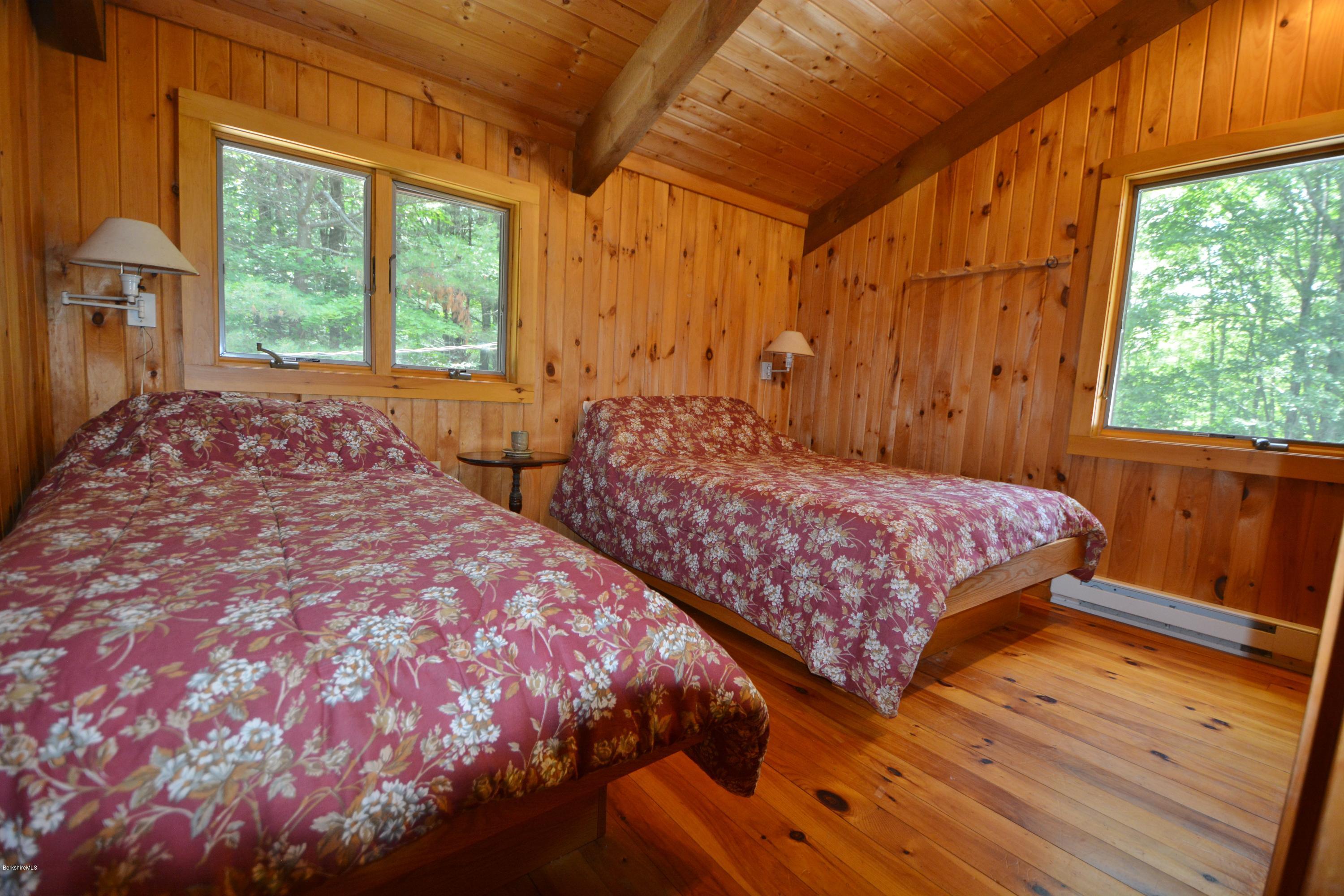 395 Bonny Rigg Hill Road Becket, MA 01223 - Photo 13 of 26 a bedroom with two beds and next to a window