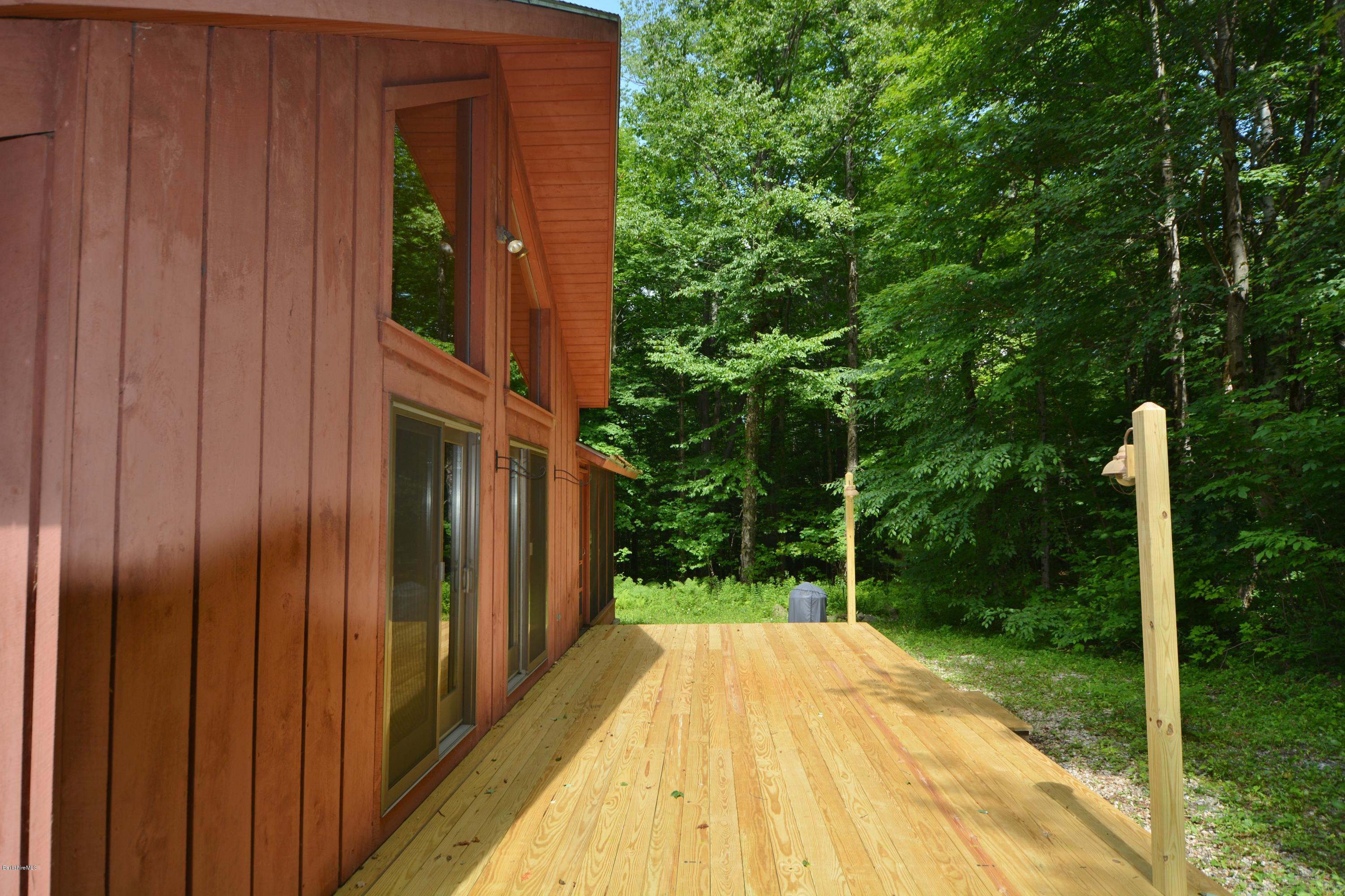395 Bonny Rigg Hill Road Becket, MA 01223 - Photo 18 of 26 a view of backyard with green space