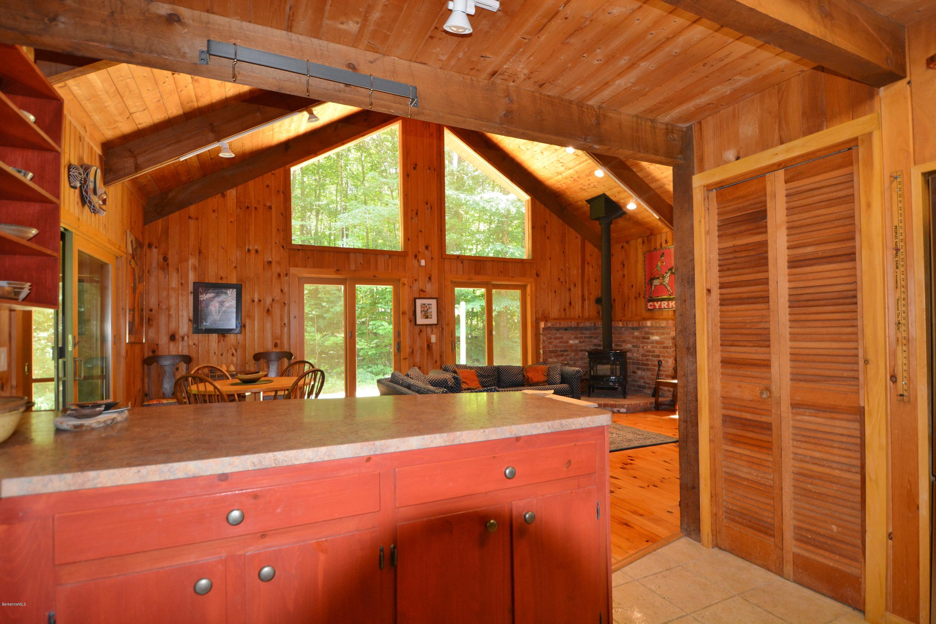 395 Bonny Rigg Hill Road Becket, MA 01223 - Photo 6 of 26 a lobby with furniture and floor to ceiling window