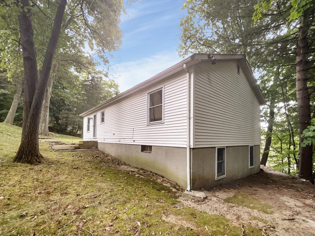 30 Manhattan Road Worcester, MA 01602 - Photo 5 of 27 a view of a house with a yard and large tree