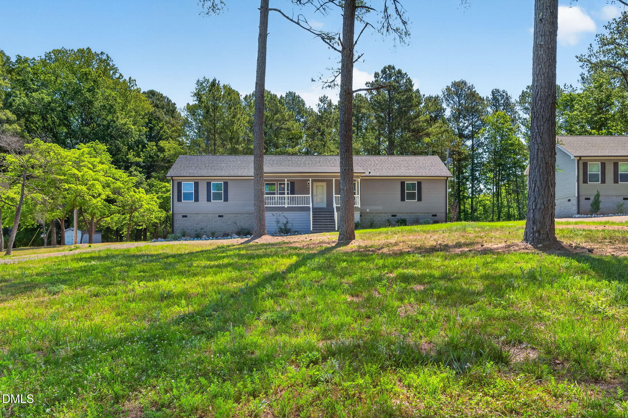 7122 Guess Road Hillsborough, NC 27278 - Photo 17 of 48 a view of a house with a yard