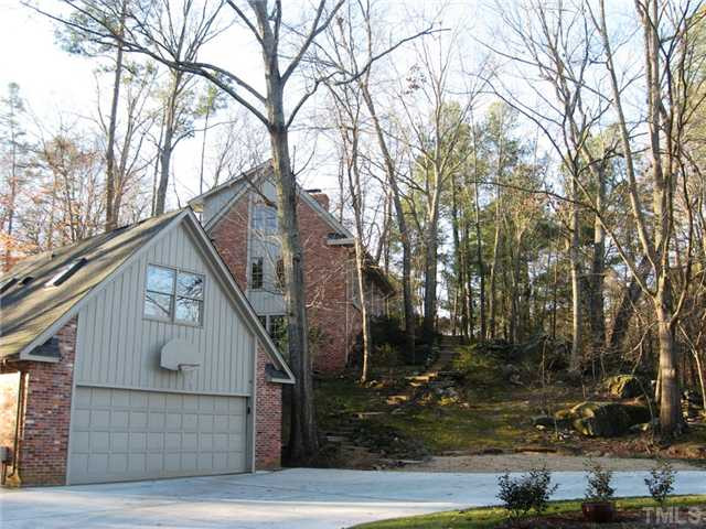 2013 Yorkgate Drive Raleigh, NC 27612 - Photo 22 of 25 Even the garage is pretty! The owners added a circle drive way and extra parking spaces outside the 2 car garage.