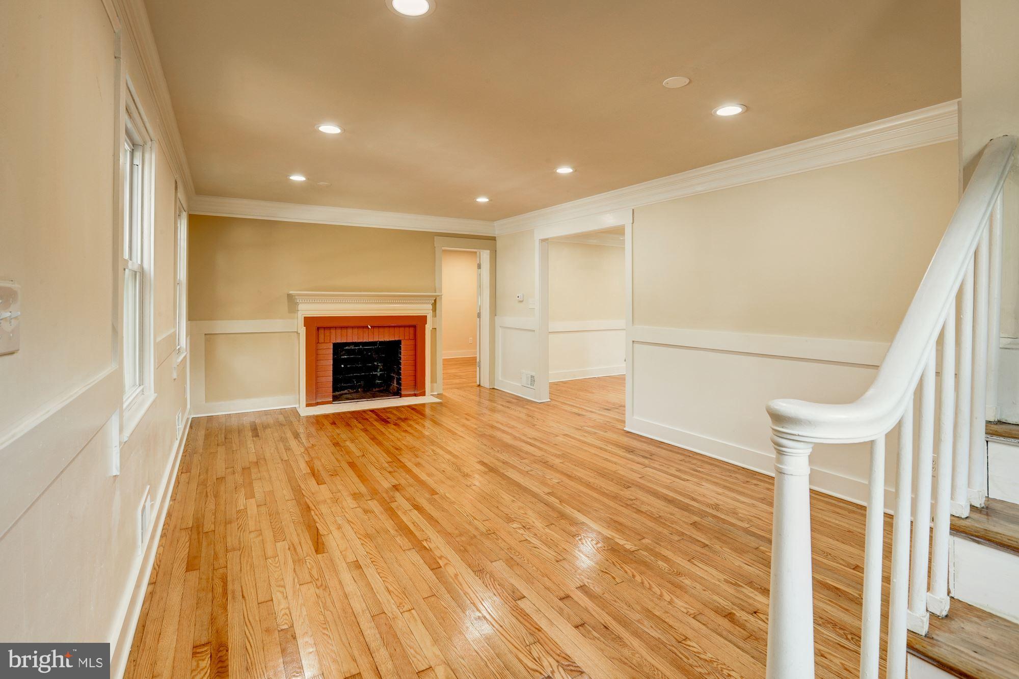 6502 Livingston Road Oxon Hill, MD 20745 - Photo 17 of 37 Very Large living room with fireplace.