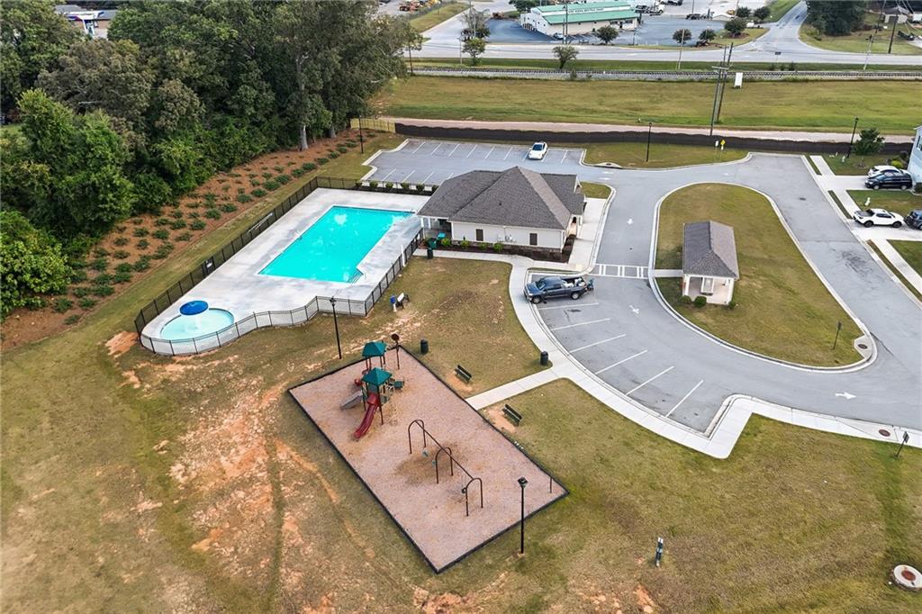 297 Starbuck Parkway Pendergrass, GA 30567 - Photo 47 of 50 an aerial view of a house with swimming pool