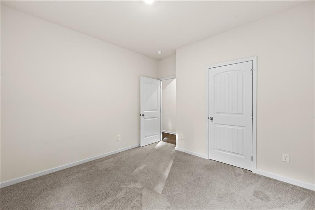 297 Starbuck Parkway Pendergrass, GA 30567 - Photo 8 of 50 a view of an empty room