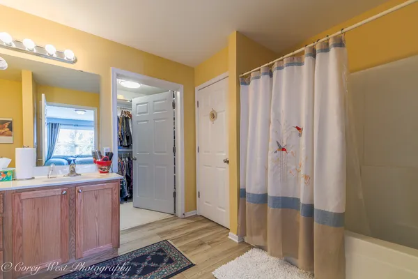 a bathroom with a sink and mirror