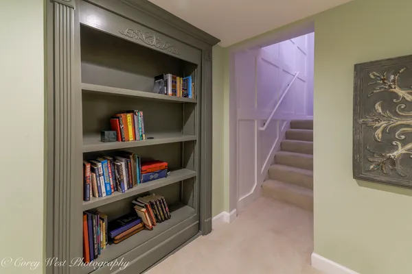 a living room with furniture and a rug