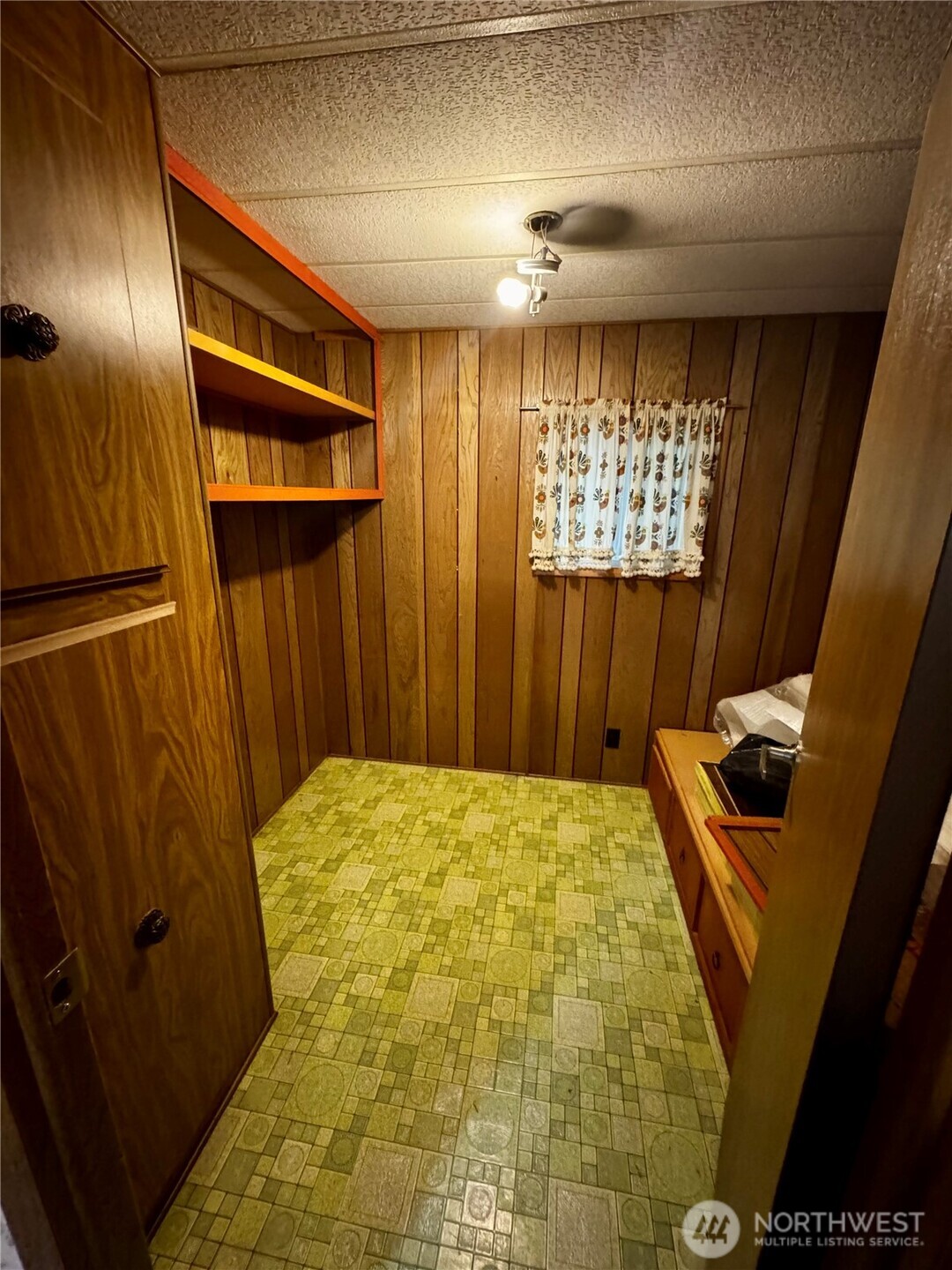 20501 31st Drive Southeast Bothell, WA 98012 - Photo 10 of 11 a bedroom with a bed and a window