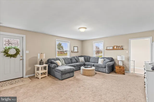 a living room with furniture and a couch