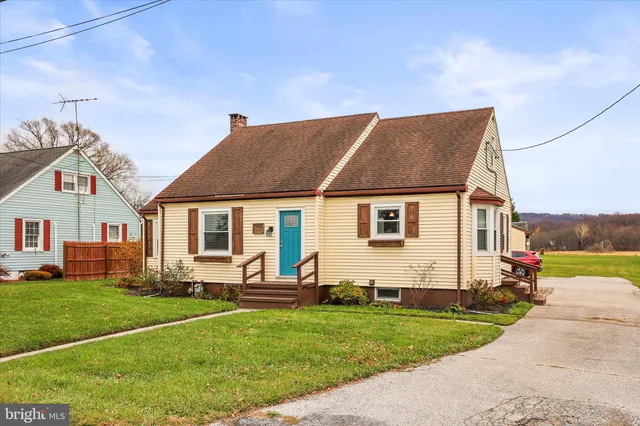 a aerial view of a house with garden