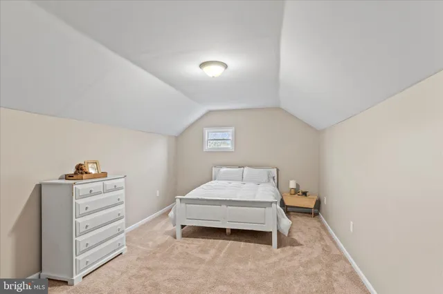 a bathroom with a sink toilet and mirror