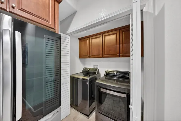 a kitchen with a stove and a microwave