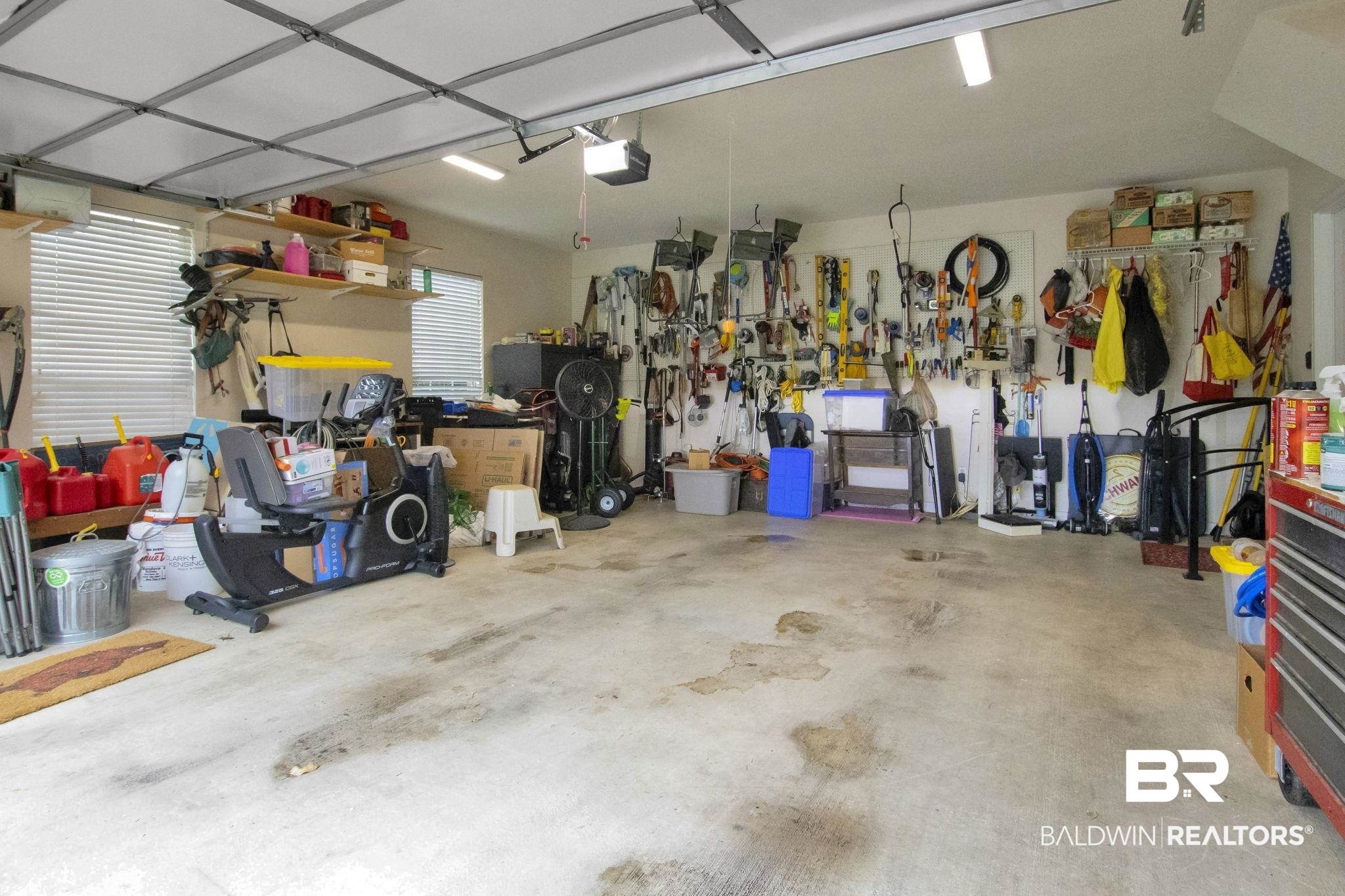1 Bens Bluff Daphne, AL 36527 - Photo 52 of 56 Garage with a garage door opener and a workshop area