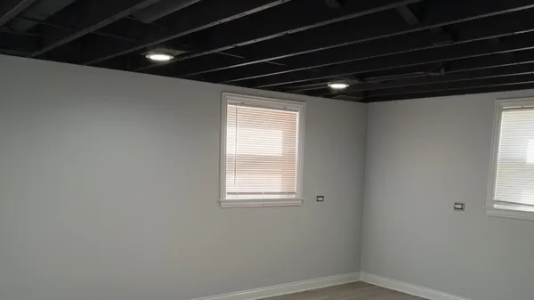 a view of empty room with windows