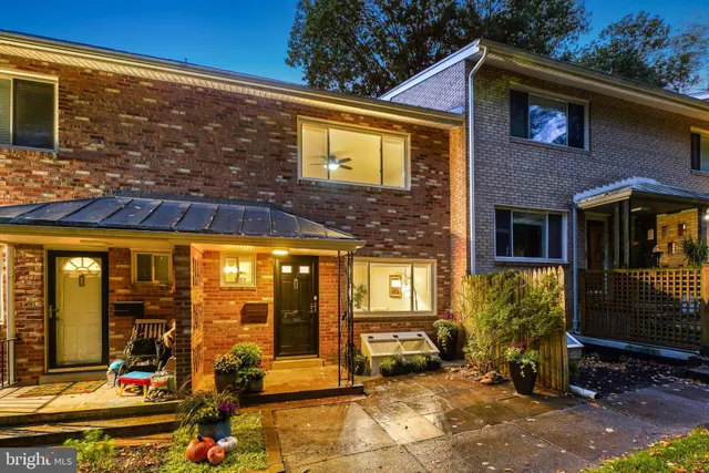 a view of a building with sitting area