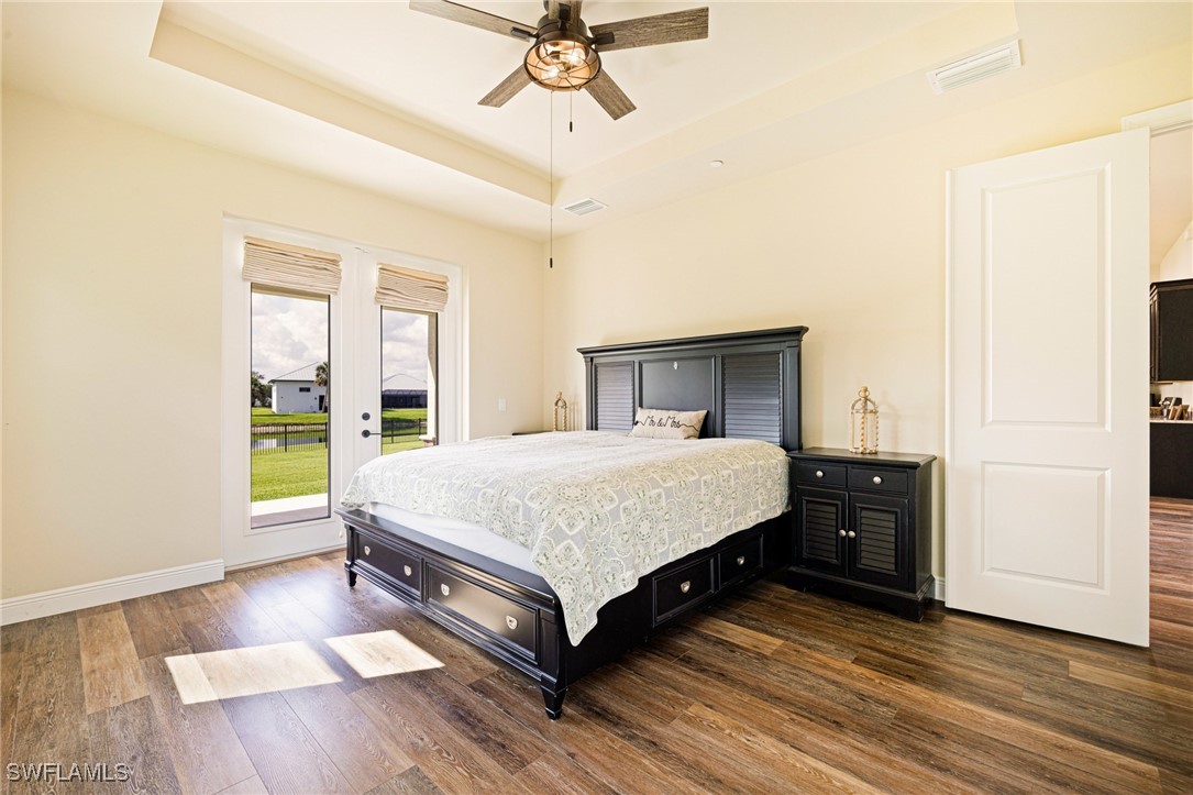 16630 Willow Point Court Alva, FL 33920 - Photo 19 of 46 a bed sitting in a bedroom next to a window