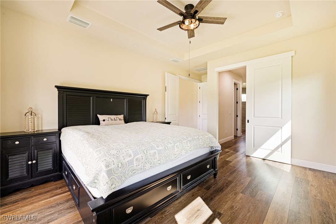 16630 Willow Point Court Alva, FL 33920 - Photo 20 of 46 a bed room with a bed and a closet