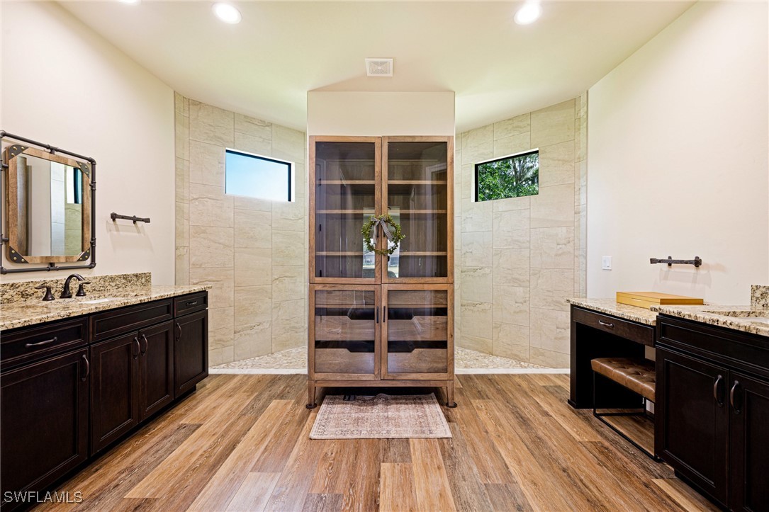 16630 Willow Point Court Alva, FL 33920 - Photo 21 of 46 a kitchen with a sink and wooden floor