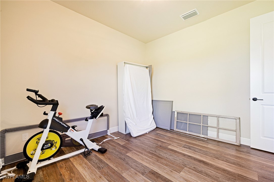 16630 Willow Point Court Alva, FL 33920 - Photo 30 of 46 a view of a room with gym equipment