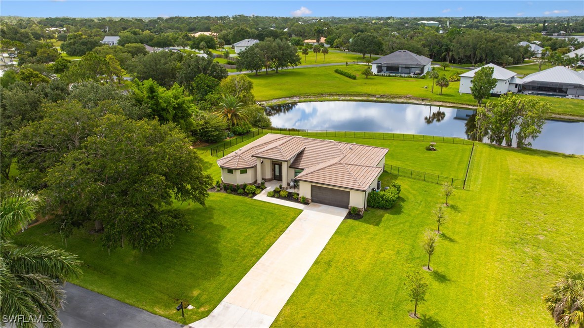 16630 Willow Point Court Alva, FL 33920 - Photo 40 of 46 an aerial view of a house with a swimming pool