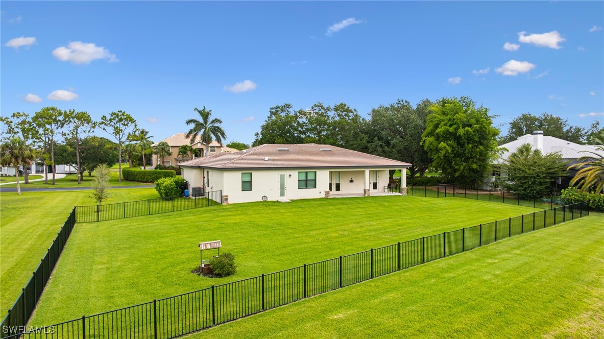 16630 Willow Point Court Alva, FL 33920 - Photo 41 of 46 a view of an house with backyard space and balcony