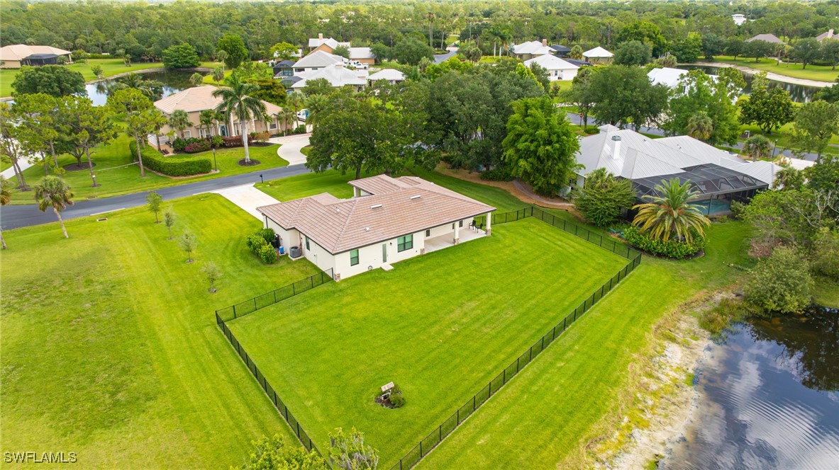 16630 Willow Point Court Alva, FL 33920 - Photo 44 of 46 a view of a house with a yard