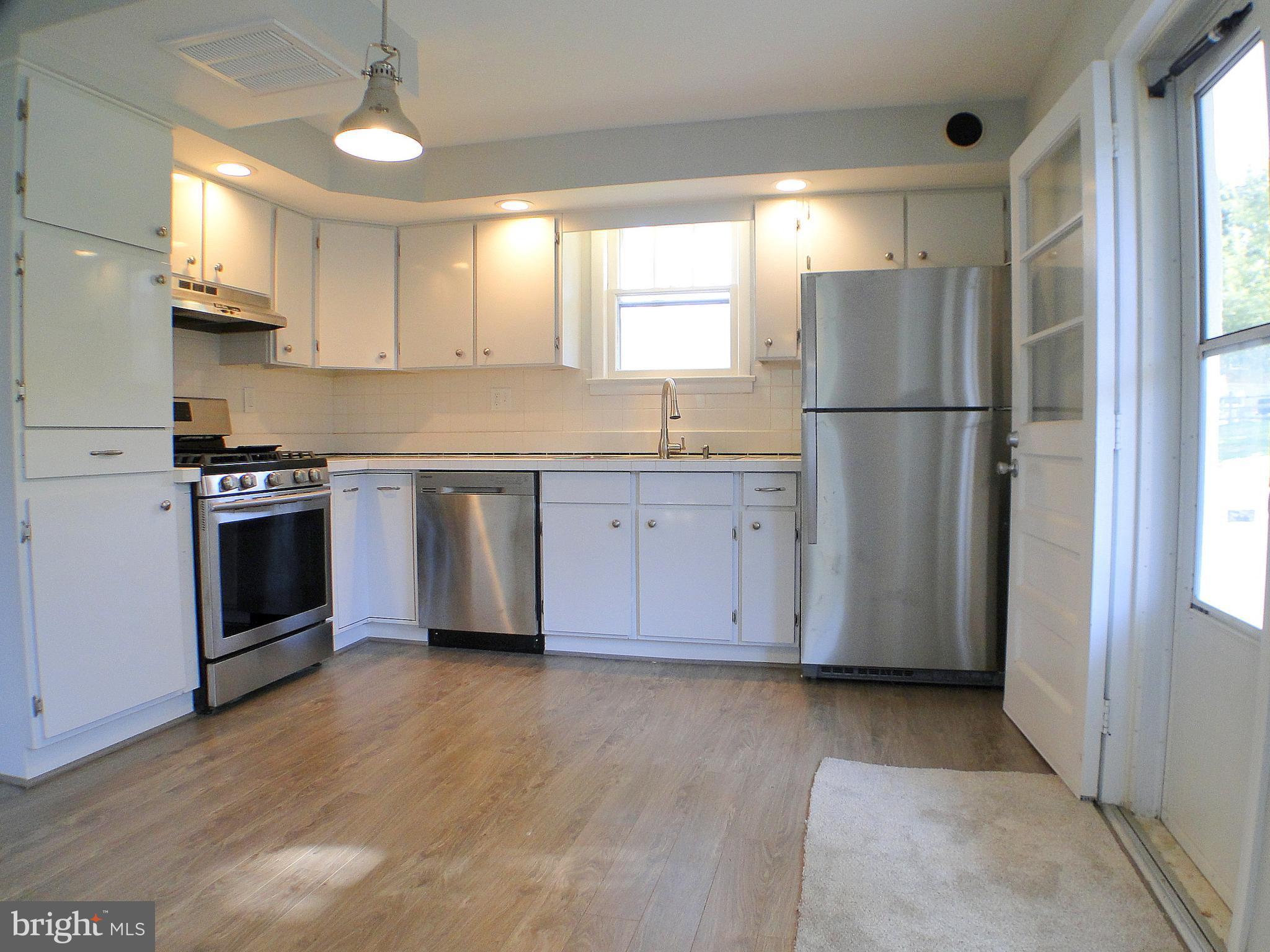 5008 Silver Spring Road Perry Hall, MD 21128 - Photo 6 of 28 Beautiful Laminate Wood Floors Throughout Main