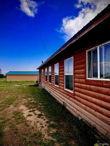 a view of a large area with wooden fence