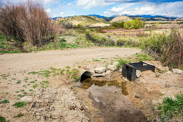 a view of a house with snow in the yard