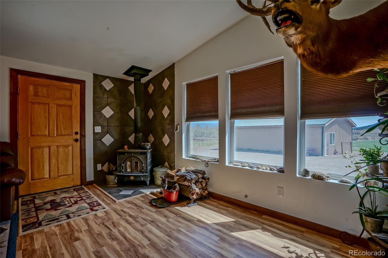640 P County Road 571 Gardner, CO 81040 - Photo 18 of 47 a view of a room with gym equipment