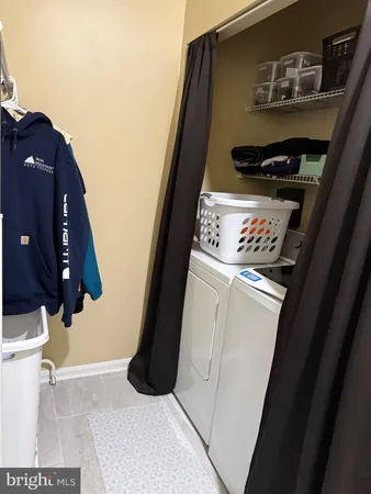a bathroom with a sink and a shower curtain
