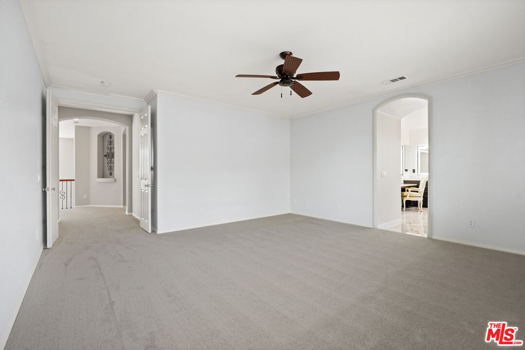 23871 Rio Ranch Way Valencia, CA 91354 - Photo 14 of 46 a view of empty room with windows